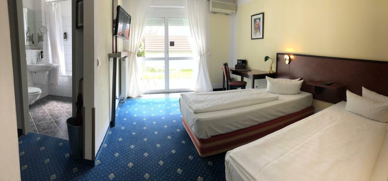 הלברגמוס Regentpark Hotel Munich Airport מראה חיצוני תמונה